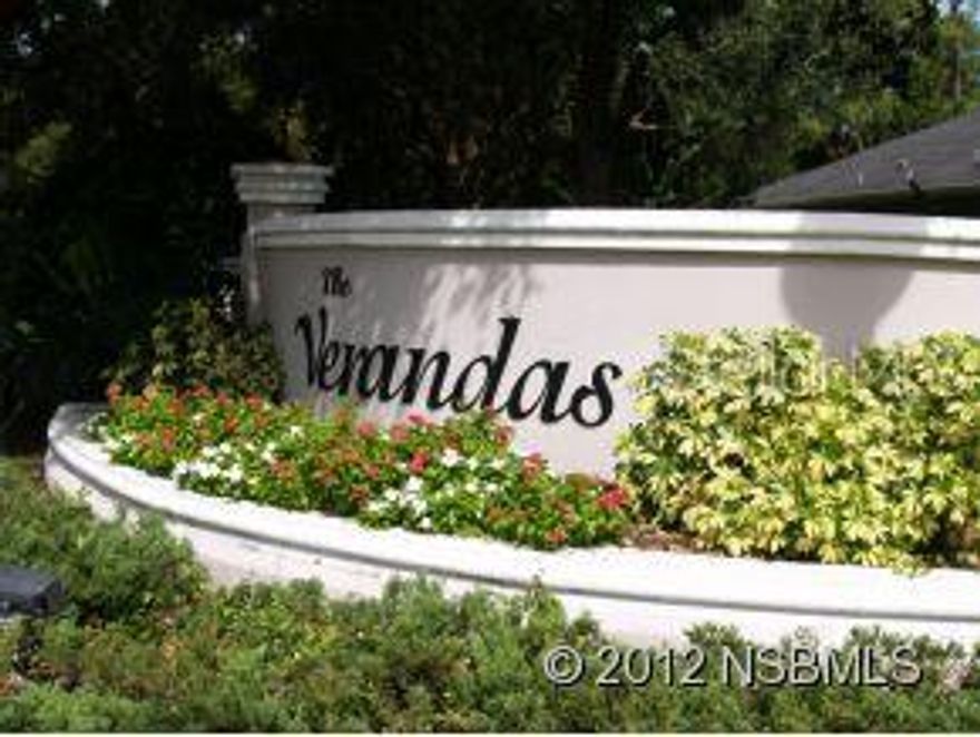 Beautifully wooded residential lot in gated community, The Verandas. Partially cleared, gorgeous oaks. Lot backs up to pastoral setting, overlooking large pasture. Great community with affordable H.O.A. dues, and central location, close to everything. Great building site for your custom home, in an established community of newer, upscale homes. Close by Sugar Mill Country Club offers memberships for full golf, social/dining or sports membership. Enjoy the country club lifestyle, with championship golf on one of Florida's top-rated golf courses, or simply use the swimming pool, tennis courts or fitness center, all with dining room priviliges. See attachment for detail membership information.; Cleared: Partial ;Water: Available at Site