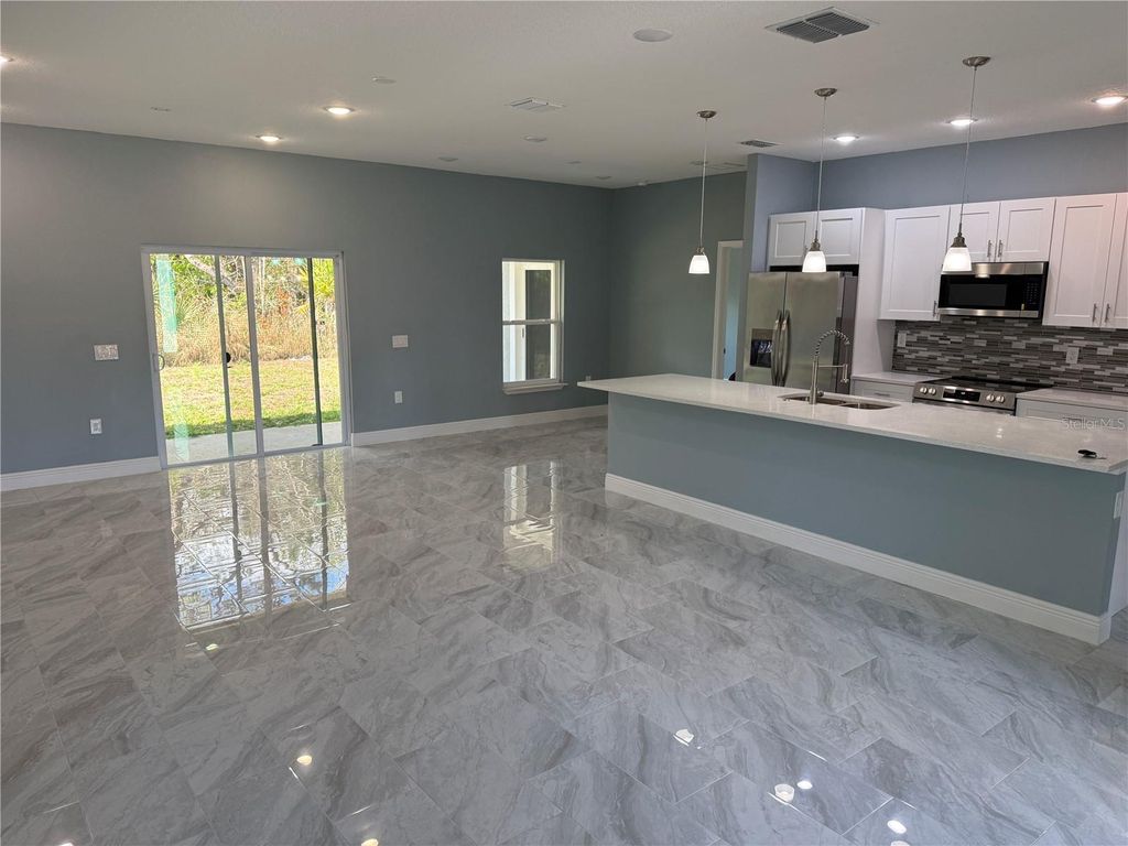 Photo of 463 Martigues Drive, Kissimmee, FL 34759 (MLS # O6387241)