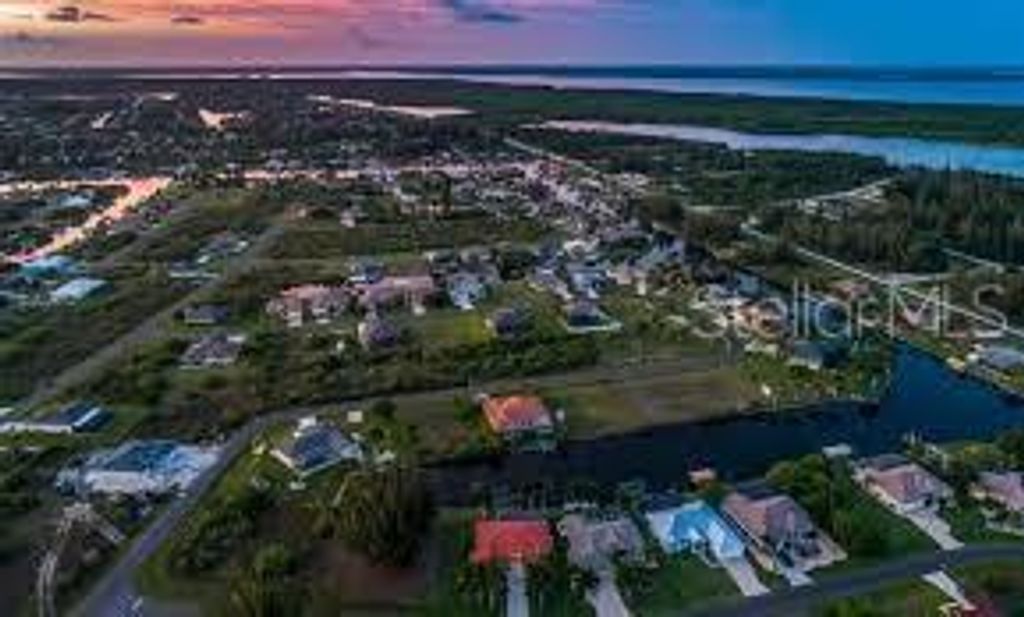 Photo of 10480 Kingsville Drive, Port Charlotte, FL 33981 (MLS # A4691715)