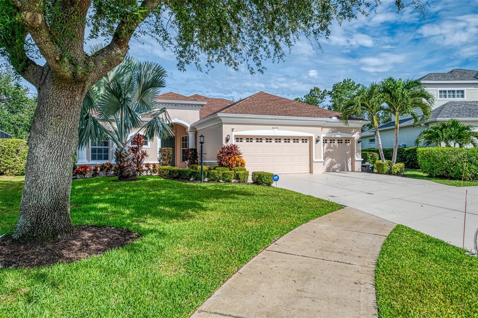 Idyllic family pool home in Lakewood Ranch! Are you dreaming of the perfect family home on a cul de sac with lush tropical vegetation and tranquil pond views? This 4 bedroom, 4 (full) bathroom home is situated on an outstanding, and rare, cul de sac lot, with wide views of the pond and natural setting in Greenbrook Village. The generous lanai with pool and spa is fully caged for year round enjoyment. Mature landscaping and plantation shutters complete the exterior charm. The interior ground level features a large eat-in kitchen with a gas range, separate breakfast nook and formal dining room. The ground level includes the oversized master suite with a sitting area and large en suite bathroom, two additional guest bedrooms, two additional full baths and the large laundry room with abundant storage. The upstairs features a large bonus room and guest suite with the fourth full bathroom, making it the perfect space for teens or guests and activity area / game room. The attached three-car garage provides ample space for your vehicles, toys and storage. Enjoy walking to the parks nearby as well as both the fantastic elementary and middle schools.
Additional features include: Water heater replaced in June 2022; Culligan water softener installed in 2018; Whole house generator installed 2020; Freshly painted inside and out and driveway sealed in 2025; Home is wired for an ADT security system.