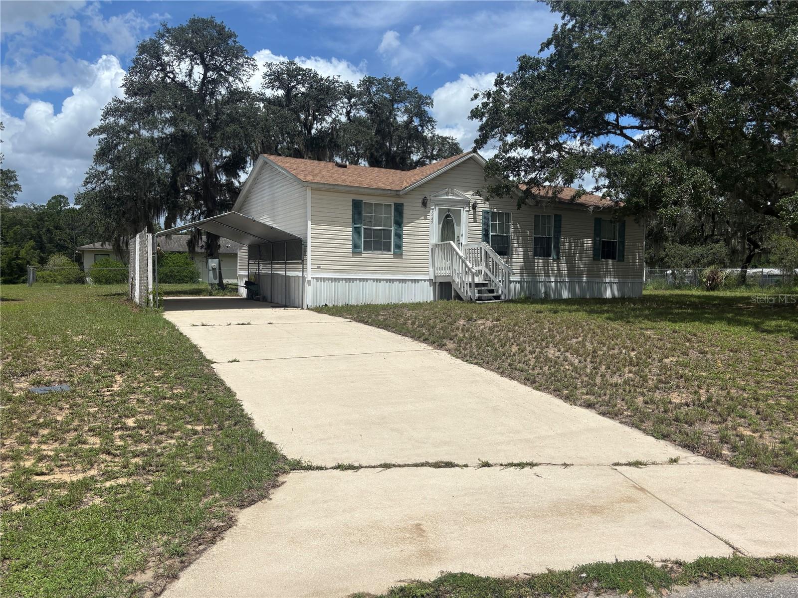 Super quiet cul-de-sac, one way in, one way out. 3/2 split plan in excellent condition, living room, kitchen all open area, huge kitchen & dining area. inside laundry, large backyard, concrete driveway leads to one carport. 1/4 at most to beautiful 700-acre Lake Bryant w/ public boat ramp etc. This private spot will not last on the market! Hurry!