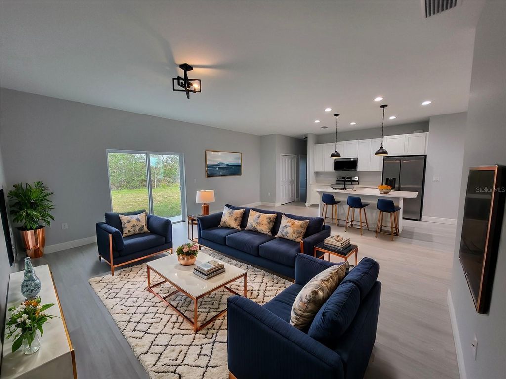 Photo of 12168 Van Gough Avenue, Port Charlotte, FL 33981 (MLS # OM707954)