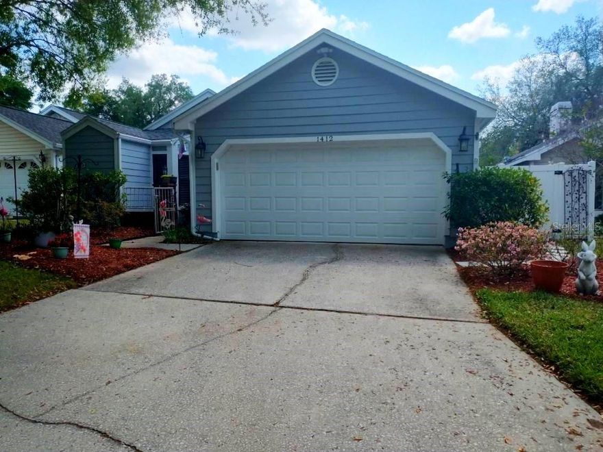 WALDEN OAKS SUBDIVISION - Beautiful, quaint 2 bedroom 2 bath home. Master bedroom has wood flooring, dual sinks and a large walk in closet with a private bath. 2nd bedroom can be used as a bedroom or office, and has wood flooring as well. French doors open up to a large screened lanai overlooking the backyard. Roof was replaced in 2024 and HVAC was replaced in 2025. Minutes to I-4 and Downtown Plant City.