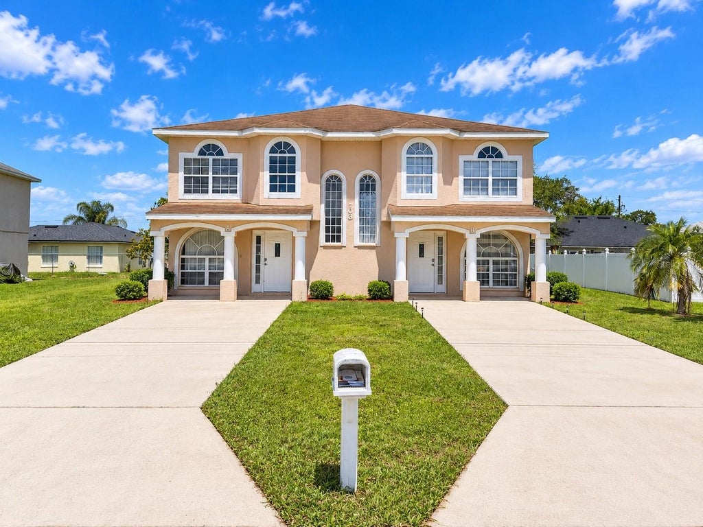 Photo of 703 Bluebill Place #A, Kissimmee, FL 34759 (MLS # S5159103)