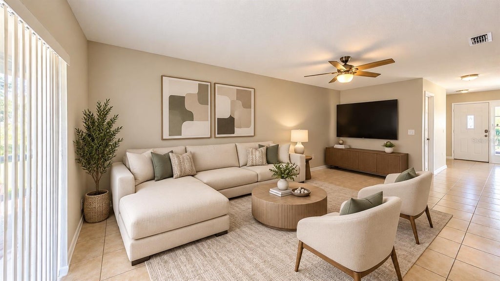 Photo of 703 Bluebill Place #A, Kissimmee, FL 34759 (MLS # S5159103)