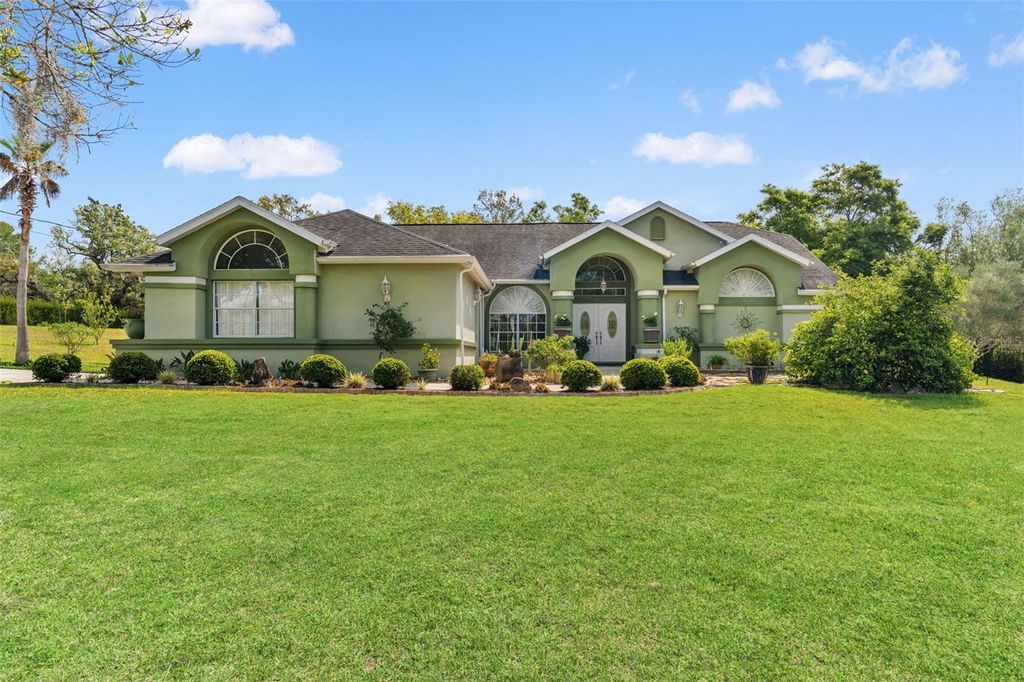 Photo of 9050 Weeping Willow Street, Brooksville, FL 34613 (MLS # TB8501749)