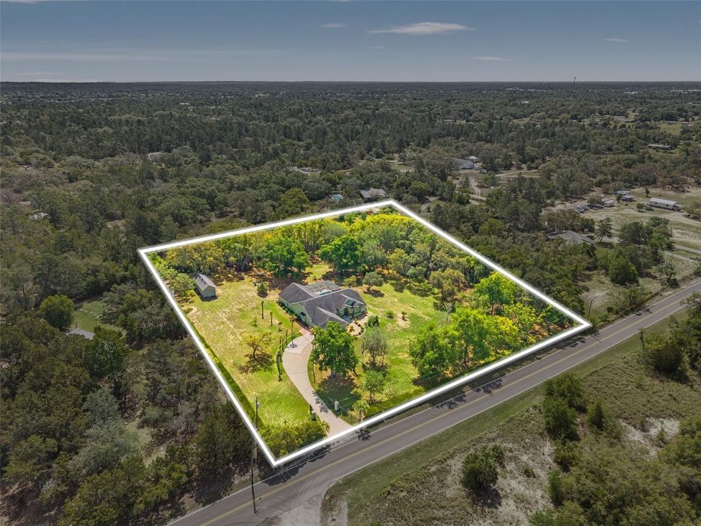 Photo of 9050 Weeping Willow Street, Brooksville, FL 34613 (MLS # TB8501749)