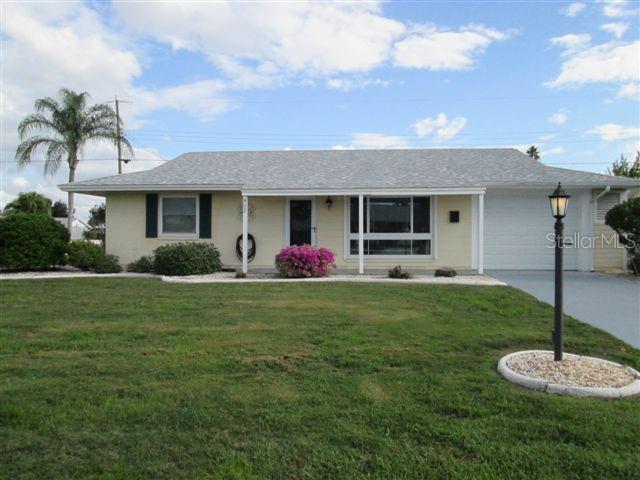 ANNUAL LEASE ONLY. Available August 1, 2025. Don’t let the age of this home fool you. This is an unfurnished two bedroom, 2 bath, one car garage home on a fenced corner lot on the north side of the highway in the SENIOR community of Sun City Center. There is laminate throughout with terrazzo in the kitchen and bath rooms and ceramic tile in the lanai. The kitchen is equipped with a pantry, a stainless dishwasher, range, refrigerator and built in microwave. The screened lanai with windows has a wall air conditioner. One bathroom has a walk in shower for your convenience and the other has a tub with shower. Central heat and air as well as ceiling fans in the living room, both bedrooms and the lanai will keep you comfortable all year round. There is a washer, dryer and utility sink in a separate utility room off the garage. No smoking. Small pets welcome. Lawn care and 2 Community Association memberships are included in rent.