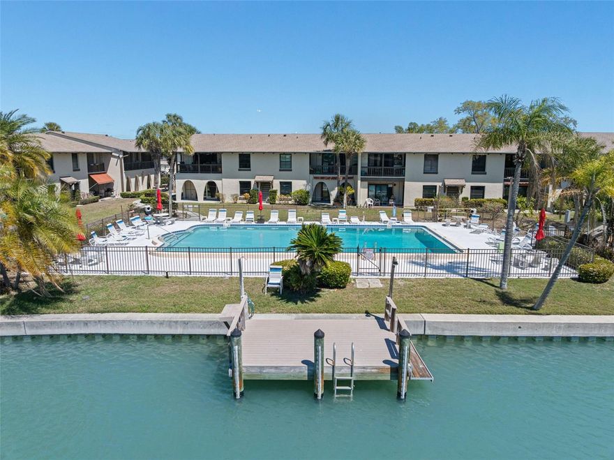 One or more photo(s) has been virtually staged. Updated waterfront condo in Treasure Island with peaceful Intracoastal views and major upgrades already completed. This beautifully updated 1-bedroom, 1-bath condo in La Costa Brava offers a great opportunity for a full-time residence, vacation retreat or investment. Recent improvements provide added peace of mind, including all NEW appliances, a brand-new A/C, roof, and water heater (2025). Freshly painted with new flooring in the bedroom and living area, this move-in-ready unit sits along a quiet canal off the Intracoastal Waterway, delivering serene water views you’ll enjoy every day. Start your mornings on the covered patio and unwind in the evenings with sunset skies reflecting over the water.
La Costa Brava features a heated pool, fishing pier, and first-come, first-served boat dock, along with assigned parking, a private storage closet and a laundry building just steps away. Located just minutes from world-famous Gulf beaches, waterfront dining and boutique shopping, with easy access to downtown St. Pete and Tampa (approximately 25 minutes), this is a rare chance to own waterfront at an approachable price point.