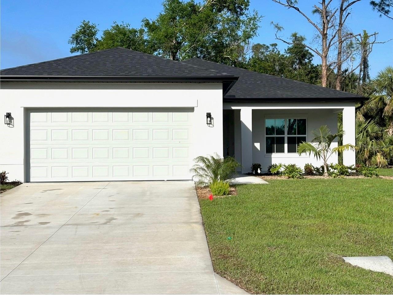 This exquisite 1,615-square-foot modern home in a great location is ready for immediate move-in. Showcasing 3 bedrooms and 2 bathrooms, this residence sets a new standard way of living. Step inside to experience premium finishes throughout. The heart of this home features a modern, stunning chef's kitchen equipped with Samsung stainless steel appliances and a spacious center island, complemented by subway tile backsplashes and quartz countertops. Includes Washer and Dryer. Beautiful Reef Gold vinyl plank flooring flows seamlessly throughout - no carpet to maintain. Details on interior decoration with dramatic ceilings create an airy atmosphere, enhanced by Maxim lighting fixtures and Moen Chateau Chrome accents. The primary bathroom features a frameless glass shower enclosure. An elegant paved driveway that provides both convenience and appeal. The property features a professional irrigation system on a 0.23-acre private lot. Built for efficiency and peace of mind, this home includes an energy-efficient Goodman HVAC system, double-pane vinyl windows, and doors.