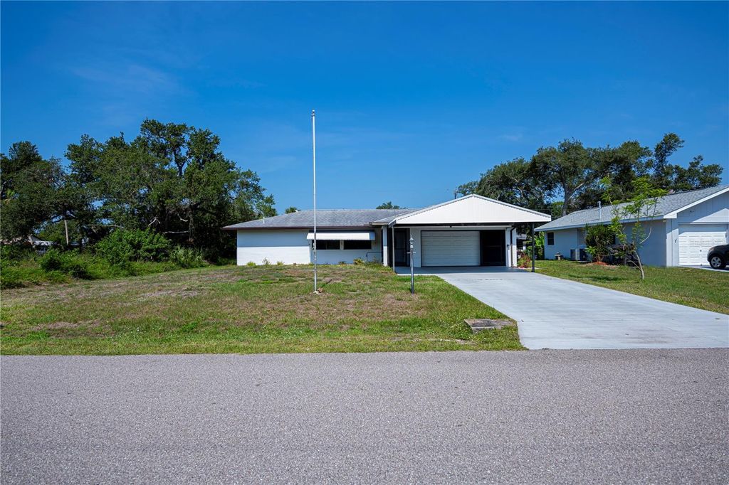 Photo of 2113 Barksdale Street, Port Charlotte, FL 33948 (MLS # C7509368)