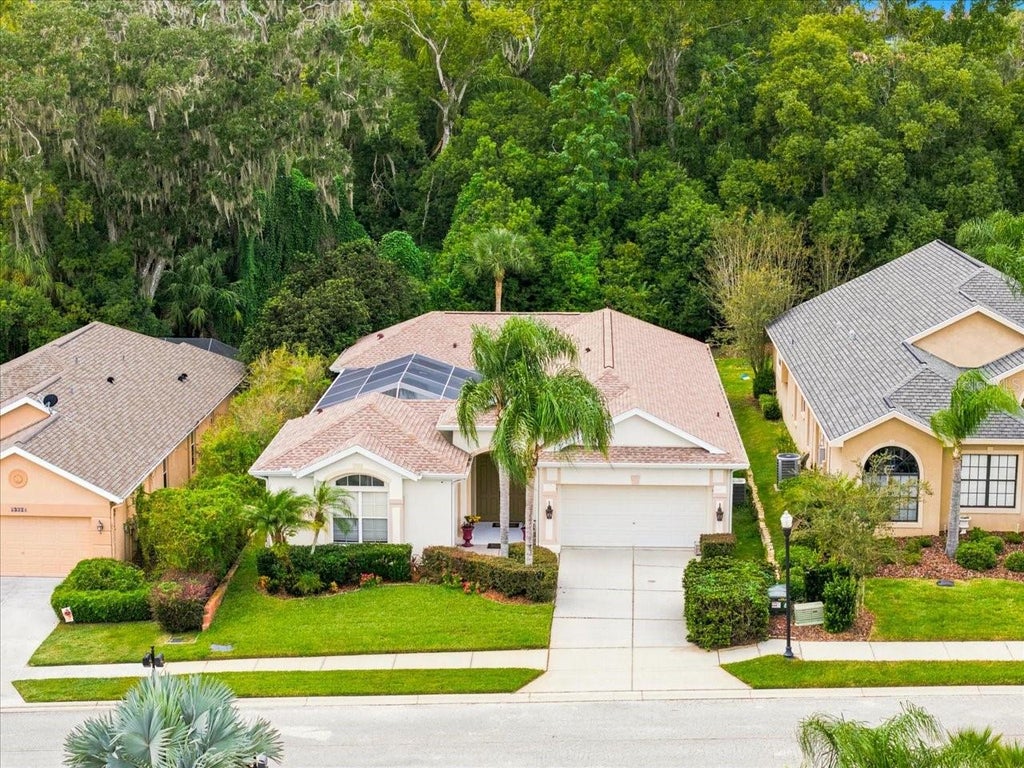 Photo of 12220 Woodlands Circle, Dade City, FL 33525 (MLS # TB8556509)