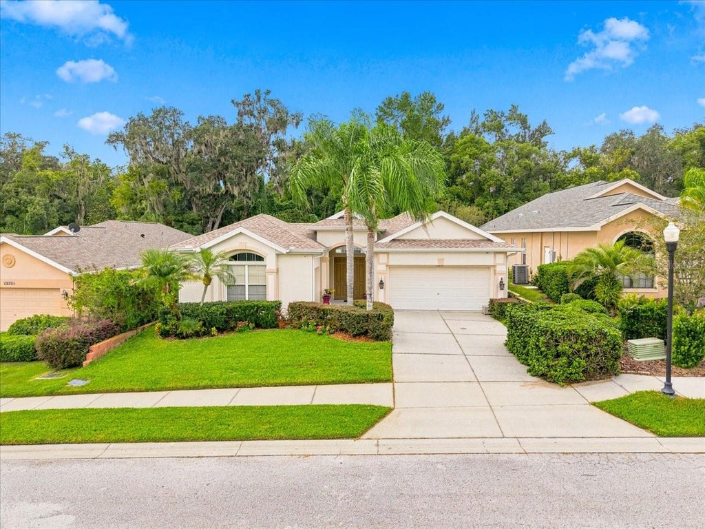 Photo of 12220 Woodlands Circle, Dade City, FL 33525 (MLS # TB8556509)
