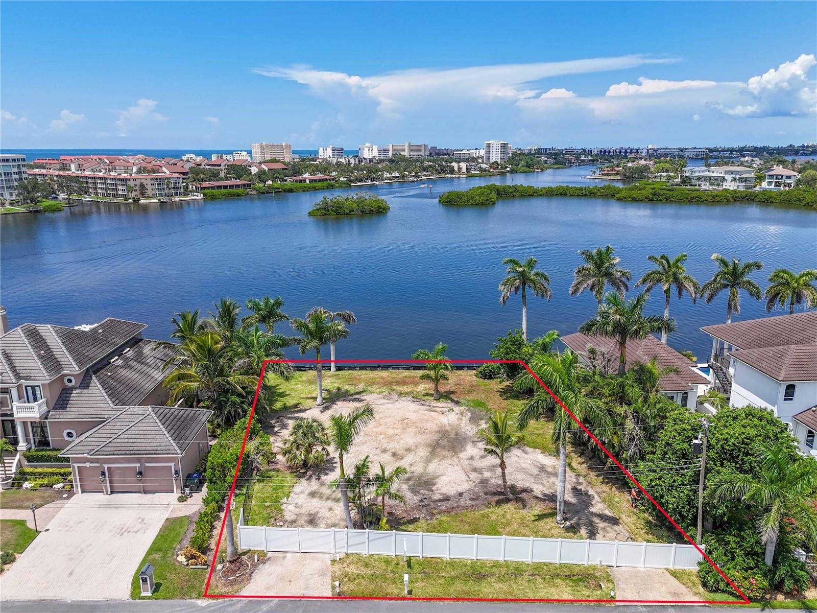 Island Vibes Without the Island Hassle – Build Your Dream Coastal Escape
Rare opportunity to own a 12,533 sq ft waterfront lot just minutes from world-famous Siesta Key. This expansive 102 x 120 ft homesite offers 102 feet of concrete seawall frontage along the Intracoastal Waterway—ideal for boating, paddleboarding, or simply soaking in the serene views. Positioned at the end of a quiet cul-de-sac and surrounded by multi-million-dollar estates, this property promises privacy, prestige, and endless potential.
Enjoy unobstructed sunset views over Sarasota Bay from your future backyard oasis. With direct water access, you’ll be launching your boat or enjoying cocktails by the water in no time. Located less than a mile from Crescent Beach and Siesta Key, you’ll experience the best of island living—without the tourist congestion.
Whether you’re looking to build a year-round residence or a luxurious vacation retreat, this lot offers the ultimate Florida lifestyle—close to top-rated schools, shopping, dining, and just minutes from the powdery white sands of Siesta Key Beach.
Survey available. Contact us today to walk the property and explore the possibilities.