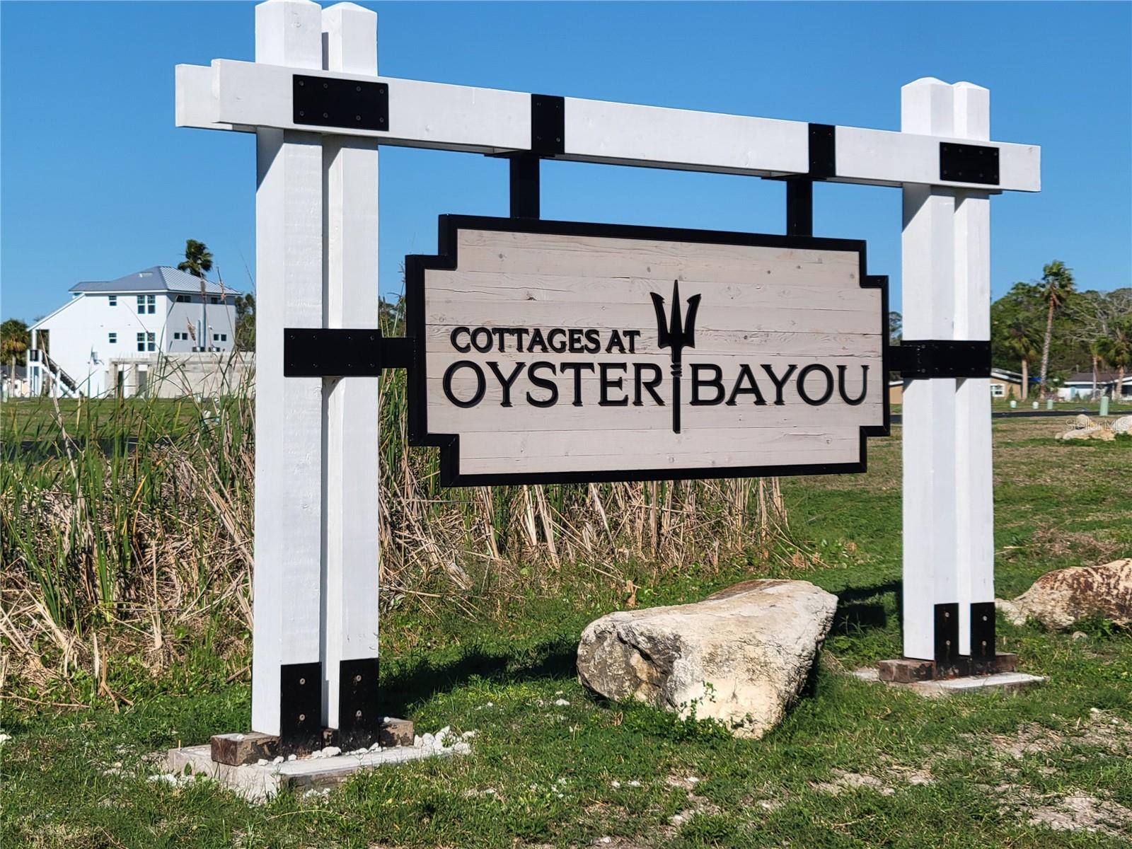 Waterfront Community Lot – Gulf Access & Coastal Living! This rare opportunity to own a prime piece of land in Cottages of Oyster Bayou, a hidden gem offering private boat ramp access and direct Gulf of America access! This property is perfect for those who love boating, fishing, and coastal living. Nestled in a coastal community, you'll enjoy tranquil surroundings while being just minutes from Green Key Beach at Robert K. Rees Memorial Park, where you can soak in breathtaking sunsets. With paved roads, utilities available and proximity to shopping, dining, and entertainment. No time frame to build, work at your own pace. Boat directly to the Gulf of America in less than 3 minutes, from your home. This lot is an ideal location for your dream home or investment property. Don't miss out on this chance to embrace the Florida waterfront lifestyle—schedule a viewing today!