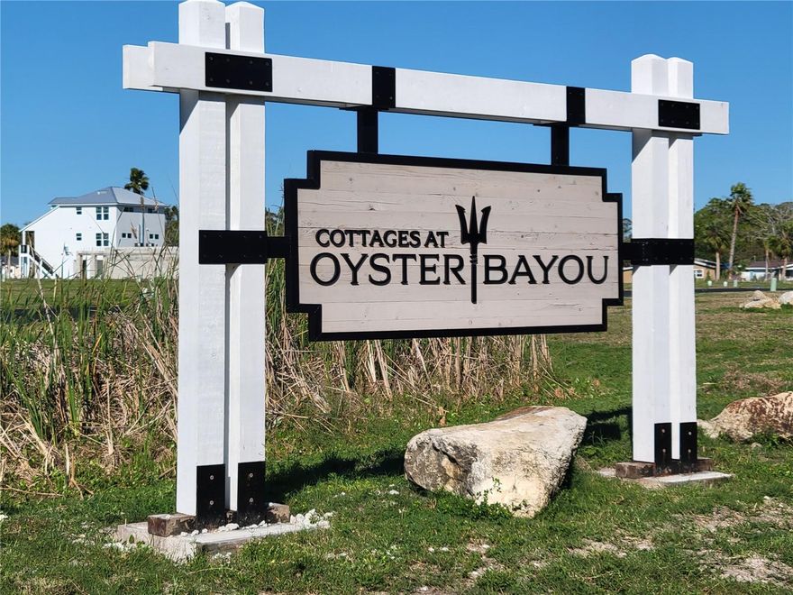 Waterfront Community Lot – Gulf Access & Coastal Living!  This rare opportunity to own a prime piece of land in Cottages of Oyster Bayou, a hidden gem offering private boat ramp access and direct Gulf of America access! This property is perfect for those who love boating, fishing, and coastal living. Nestled in a coastal community, you'll enjoy tranquil surroundings while being just minutes from Green Key Beach at Robert K. Rees Memorial Park, where you can soak in breathtaking sunsets.  With paved roads, utilities available and proximity to shopping, dining, and entertainment.  No time frame to build, work at your own pace.  Boat directly to the Gulf of America in less than 3 minutes, from your home.  This lot is an ideal location for your dream home or investment property. Don't miss out on this chance to embrace the Florida waterfront lifestyle—schedule a viewing today!