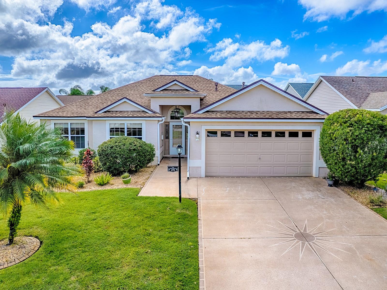VALUE OPPORTUNITY AWAITS! 3/2 OLEANDER MODEL IN THE VILLAGE OF MALLORY. ROOF (2022); HVAC (2015). Inside this home, the Foyer opens into a spacious living room, where VAULTED CEILINGS and LAMINATE FLOORING flow seamlessly through the main living areas creating a warm and inviting atmosphere. The home features Architectural details, including a LARGE ARCHED PALLADIUM WINDOW that adds Character and Charm allowing lots of NATURAL LIGHT to shine through! The Large Eat-in Kitchen has Ceramic Tile Flooring, Stainless-Steel Appliances, a Center Island, plenty of Cabinet Space and a pass through window to the Dining Room making entertaining a breeze. Off the Kitchen you will find an enclosed multi-purpose bonus room which can be used as a home office, craft room, exercise room, etc.... The Dining area combined with the Light & Bright Living Room, provide an ideal space for gathering with loved ones. The enclosed Lanai has laminate flooring and offers terrific additional living space. There is a paver patio with birdcage off the enclosed lanai to enjoy the outdoors. Enter the Primary Bedroom through FRENCH DOORS, complete with a WALK-IN CLOSET, and an EnSuite Bath featuring a TILE WALK-IN SHOWER, DOUBLE SINKS, and a separate water closet. The Second and Third Bedrooms are located at the front of the home, both have Laminate Flooring and built-in closets. The nearby Guest Bath is adjacent to both guest bedrooms for added convenience as well as a large linen closet in the hallway. The LAUNDRY ROOM is located off the Kitchen and comes complete with a WASHER and DRYER plus built-in cabinets. The Village of Mallory Square offers an abundance of recreational opportunities. The Mallory Hill Country Club has 27 holes of fabulous championship golf. There are executive courses in the immediate area as well. Several neighborhood recreation centers, the closest being the tropical-themed Coconut Cove Village Recreation Center. And Mallory is just down the road from Lake Sumter Landing Market Square!