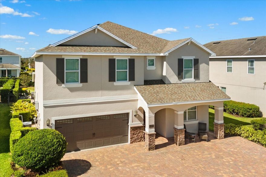 Explore this 8 bedroom, 6.5 bath residence built in 2017 with approximately 3,612 sq ft of finished living space, located in the gated community of Encore Resort at Reunion. The first-floor primary suite features a walk-in closet and en-suite bath. A generous kitchen with island and pantry opens to the great room, while upstairs includes a loft, bonus room and six additional bedrooms,many with en-suite or Jack & Jill baths. Step outside to a private pool & spa with outdoor bath access, covered porch and built-in grill for seamless indoor outdoor living. A dedicated upstairs cinema/media/play room adds further flexibility. The home sits on a 0.21 acre lot in a landscaped resort style community setting with irrigation and guest parking. Minutes to Orlando’s major attractions, this home offers privacy, size and resort amenities in one address, making it an ideal choice for personal use, extended stays, or a highly lucrative short term vacation rental opportunity.