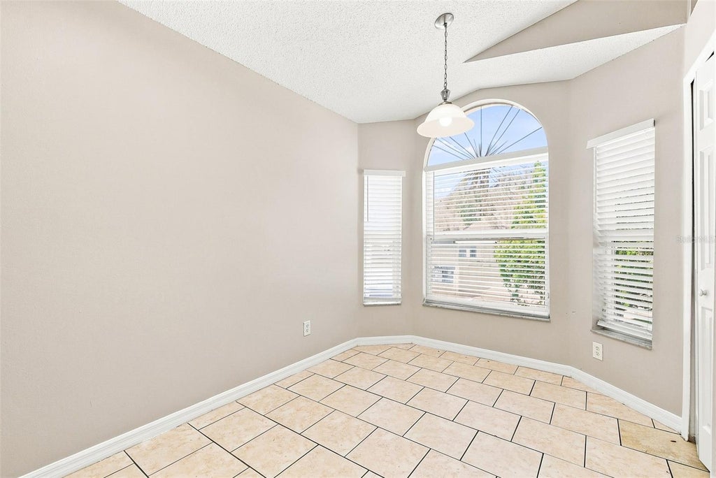 Photo of 4758 Muir Village, Orlando, FL 32808 (MLS # O6447125)
