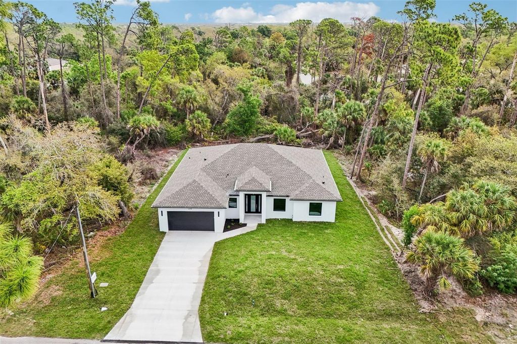 Photo of 418 Troutdale Street, Port Charlotte, FL 33954 (MLS # TB8486803)