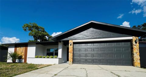 Photo of 11434 Scallop Drive, Port Richey, FL 34668 (MLS # TB8510010)