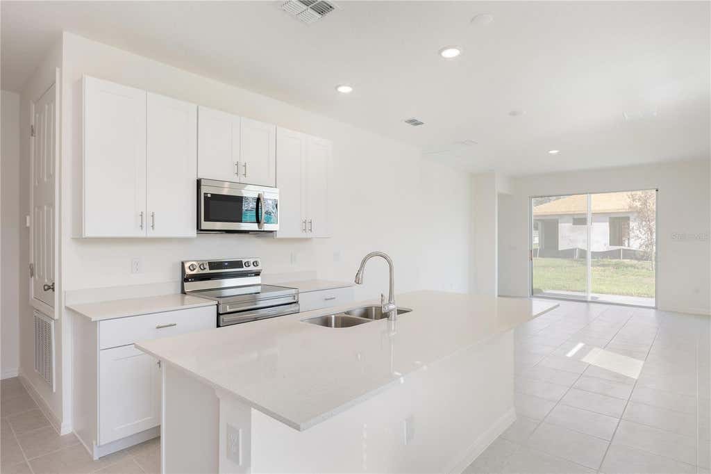 Photo of 9129 Wildlight Trail, Wildwood, FL 34785 (MLS # O6415018)