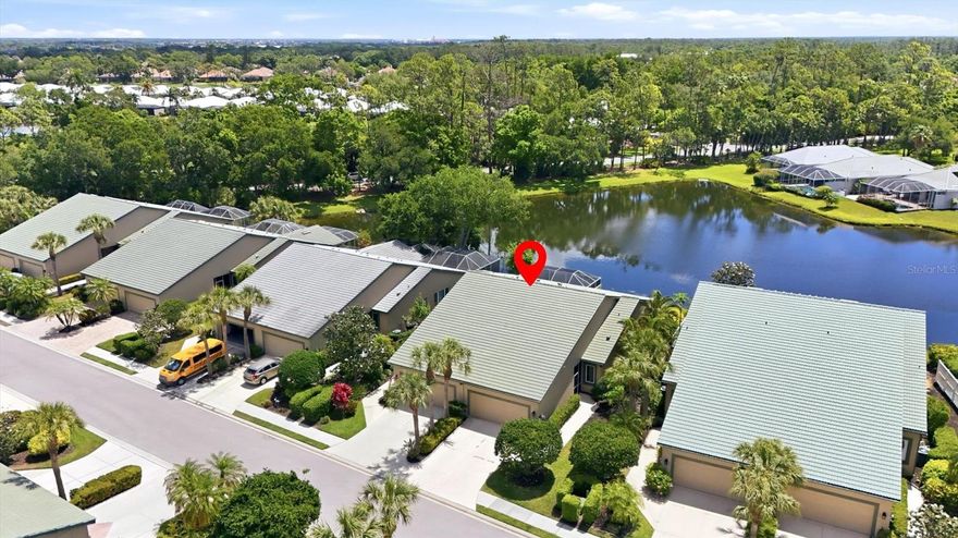 Beautiful Rosedale lakefront villa is your next home or investment property!  Featuring elegant wood laminate flooring and 2019 roof replacement—providing both style and peace of mind.

This 2-bedroom, 2-bath villa offers a spacious Primary suite complete with a large walk-in closet, walk in shower and dual sinks.  The home’s side southern exposure fills the living spaces with natural light and opens to a screened-in lanai, complemented by an additional paver deck—perfect for relaxing or entertaining while enjoying serene pond views.

Experience prestigious country club living at an exceptional value. Located within the gated Rosedale community—with no CDD fees—residents can enjoy access to premier golf and tennis amenities with a Flexible membership option including full golf, tennis, social, and seasonal packages.

Ideally situated just minutes from I-75, world-class beaches, shopping, and dining, this home also offers convenient access to downtown Lakewood Ranch and Sarasota, known for their vibrant cultural and community attractions.