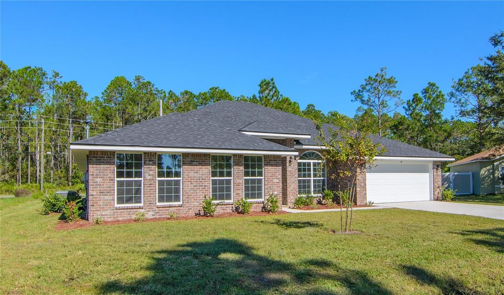 Photo of 1 Zaun Court, Palm Coast, FL 32164 (MLS # FC317936)