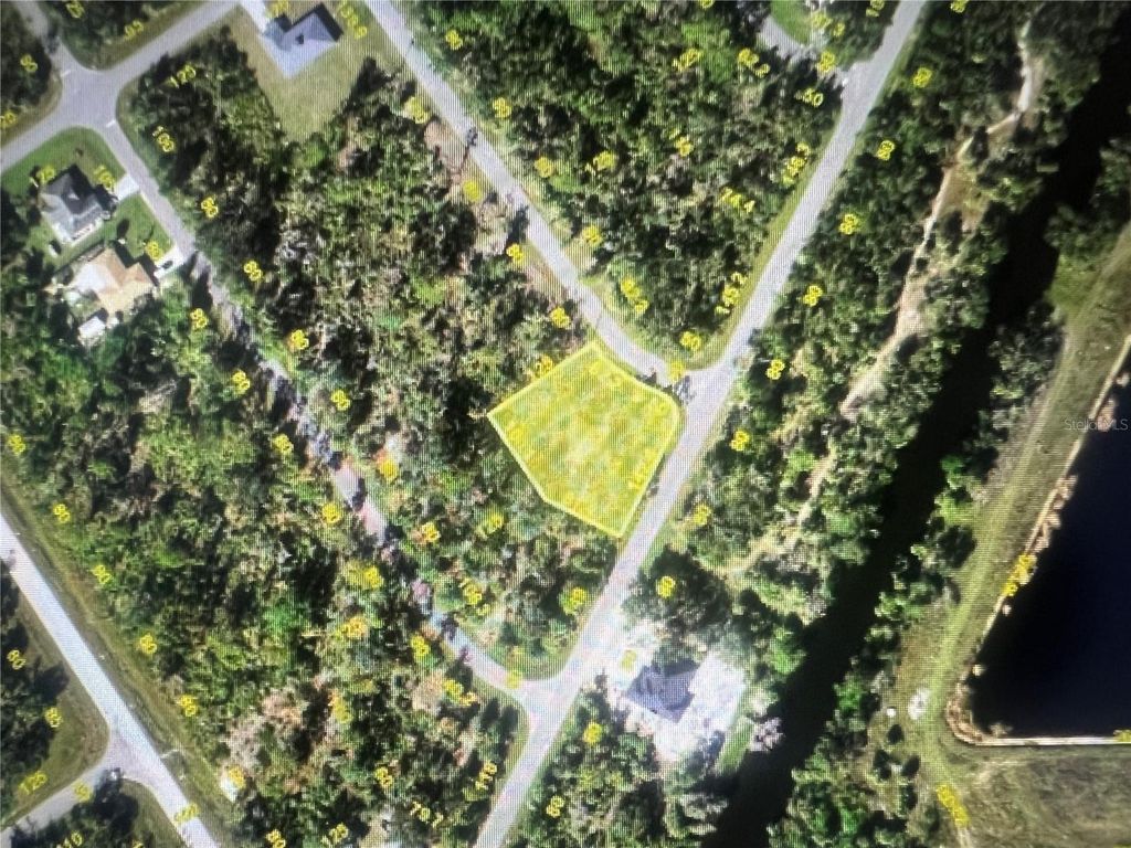 Photo of 1501 Lovett Street, Port Charlotte, FL 33953 (MLS # TB8448487)