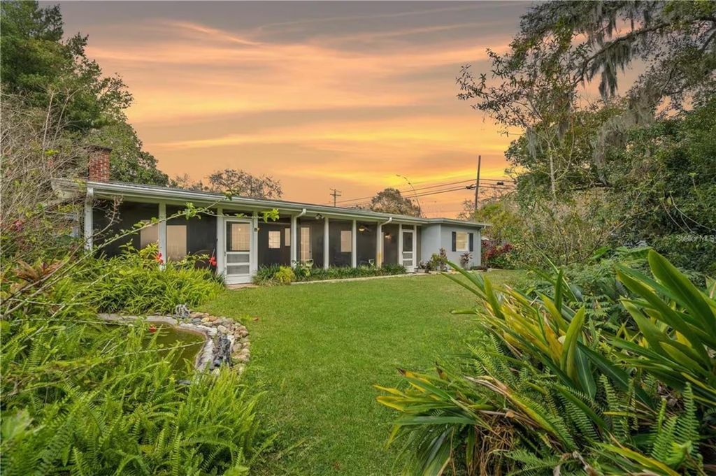 Photo of 2102 W Kyra Drive, Tampa, FL 33612 (MLS # TB8488965)