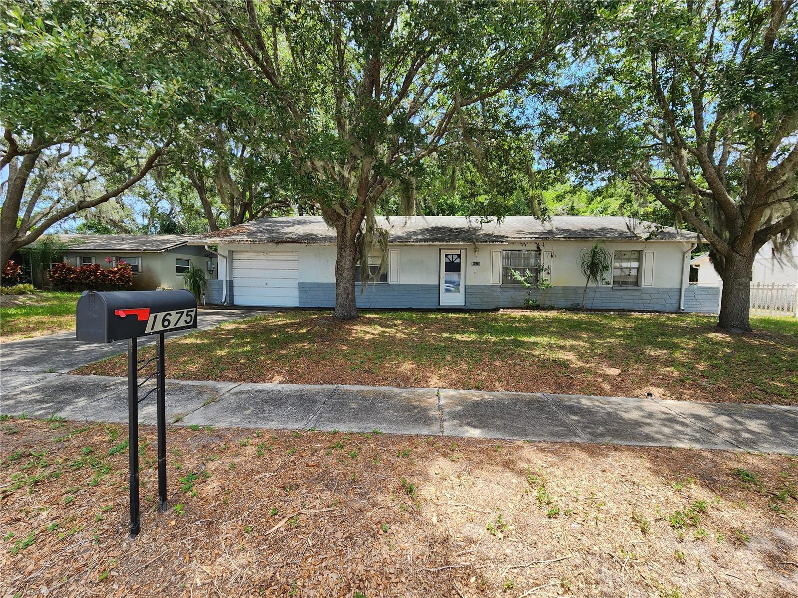Split plan, large living room, huge screened porch and large partially fenced This spacious home has a smart split-bedroom layout, giving everyone their own space. You'll love the big screened porch—perfect for relaxing year-round. The backyard is partly fenced, great for pets or kids. Shade trees in the front and back give a cozy feel and helps keep the house cool in the summer. Located in a quiet neighborhood, you're just minutes from exciting rocket launches, beautiful beaches, and it's an easy drive to Orlando for the airport or fun attractions like theme parks. With 3 bedrooms, 2 full bathrooms, and a garage, it's a great place to live, relax, and enjoy everything Florida has to offer!