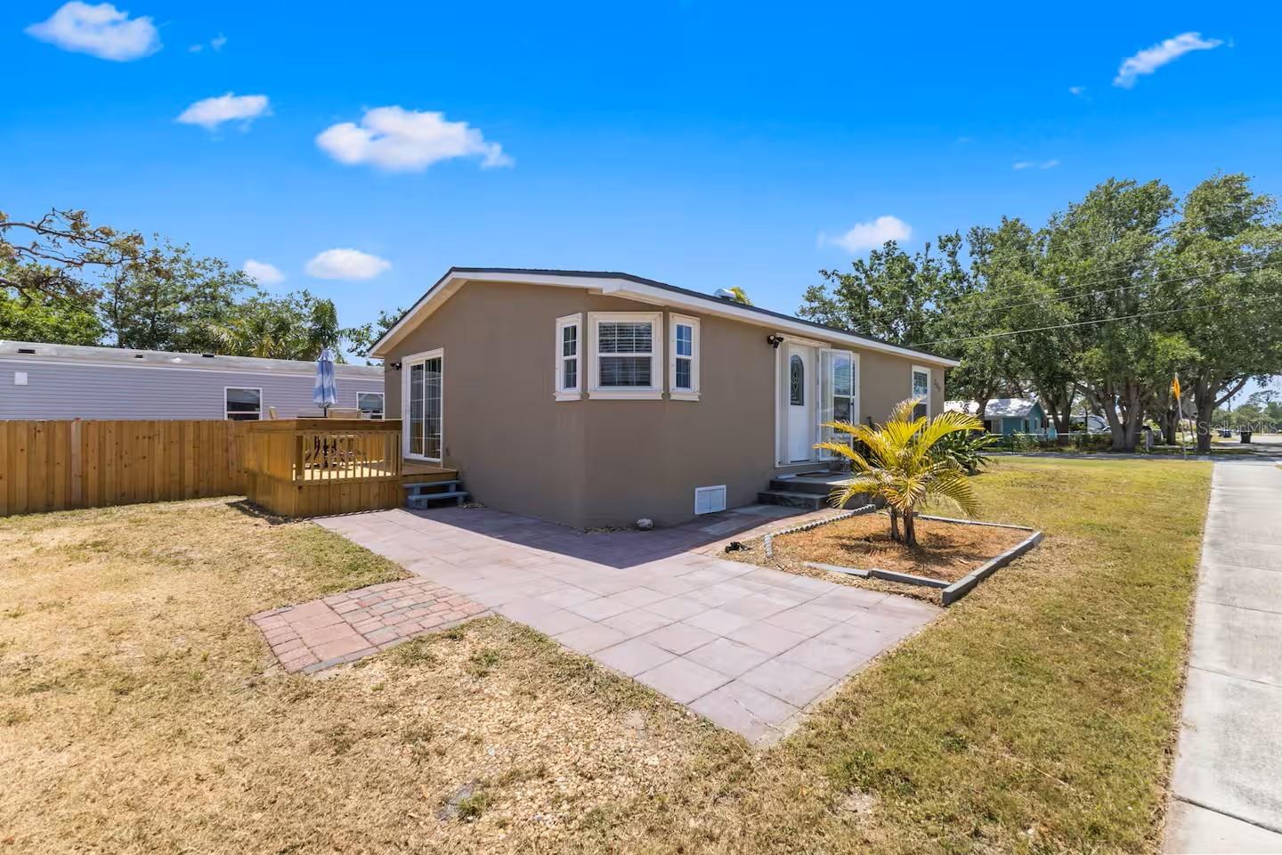 NEW ROOF INSTALLED 2025! Seller Motivated!! No HOA! No Flood Zone! Only 1.5 miles from the beach!
Discover this beautifully updated Florida home for sale just minutes from Nokomis Beach. This 2-bedroom, 2-bathroom beach house for sale is in a prime location for coastal living, only 5 minutes from the Gulf and with quick access to I-75—offering the perfect blend of beachside lifestyle and commuter convenience.
Step inside this move-in ready home featuring vaulted ceilings, fresh interior paint, and an open-concept layout that fills the space with natural light. A sliding glass door leads to the deck—ideal for outdoor entertaining or simply enjoying the Florida sunshine. The home has been thoughtfully upgraded with a brand-new HVAC system, spray foam insulation, and fully renovated bathrooms with new shower and tub systems, LED-touch mirrors, new toilets, faucets, and modern lighting switches and outlets. Finished with new ceramic tile flooring, fresh trim, and sold fully furnished, this is a true turnkey property ready for you to enjoy immediately.
Located on a corner lot in a quiet, friendly neighborhood with no deed restrictions, no flood zone, and no HOA, this property offers ample yard space to create your dream outdoor area, add a fenced yard, or build extra parking—plenty of room to make it your own.
Currently operating as a successful short-term vacation rental, this home also offers a fantastic investment property opportunity with proven rental income potential—ideal for anyone looking to grow their real estate portfolio or own a second home in sunny Florida.
Nokomis is known for its laid-back charm and outdoor activities, from boating, fishing, and swimming to camping and glamping nearby. The Legacy Trail, a 10-mile scenic bike path, connects Sarasota and Venice, while local farmer’s markets, shopping, excellent dining, and entertainment are all close by.
Don’t miss your chance to own this Florida dream home—a fully furnished, move-in ready beach house with income potential!