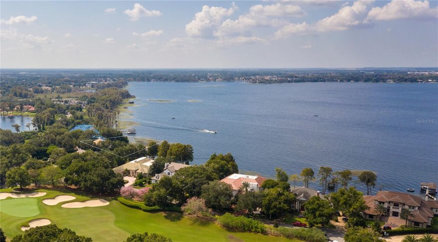 Set along the shores of Lake Butler, the property showcases gorgeous lake views and offers direct access to the famed Butler Chain of Lakes.  ,69 acres within the gates of Isleworth Country Club.