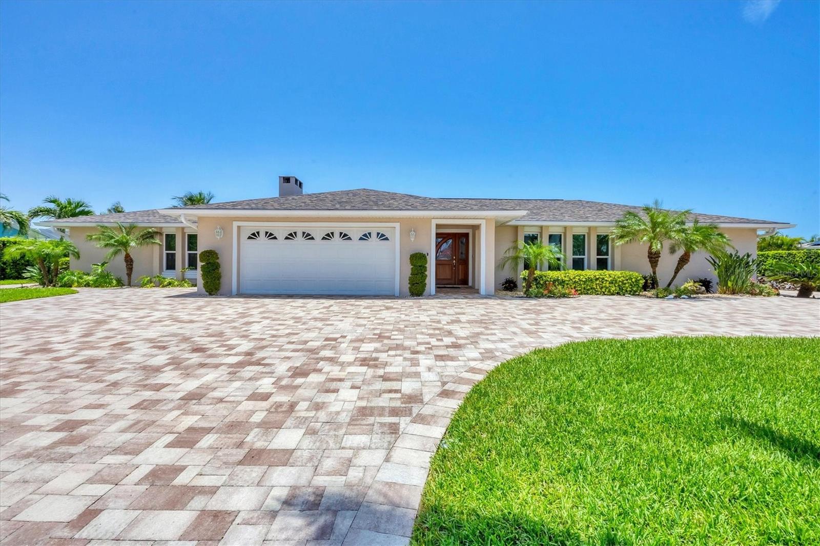 Just 4 miles from the Gulf! Proudly offered for the first time in 40 years by the owner-builder, this meticulously maintained 4-bedroom, 3-bath Seaside Ranch offers over 3,000 square feet of living space on a quiet dead-end street in the heart of west Bradenton.
The thoughtfully designed split floor plan provides excellent flow and functionality, with multiple rooms opening directly to the newly resurfaced pool and deck—ideal for entertaining or relaxing in your private tropical retreat. A private side entrance offers flexible living potential, perfect for a mother-in-law suite, guest quarters, or multigenerational setup.
Extensive upgrades include: New roof, Impact-rated windows and doors, Screened pool cage, Two Trane high-efficiency heat pumps with zoned A/C, Complete ductwork replacement, Oversized, air-conditioned garage, Circular driveway with additional RV/boat parking.
Interior features include multiple flex spaces, walk-in closets, a wet bar, jacuzzi tub, wood-burning fireplace, and more. Step outside to enjoy the resort style pool, fire pit, outdoor shower, landscape lighting, and a deep well-fed irrigation system surrounded by lush landscaping.
Located just 500 feet from Palma Sola Bay, you can walk or bike to the nearby Boat Basin and enjoy breathtaking sunsets and seasonal manatee sightings. Don’t miss your opportunity to own this one-of-a-kind, move-in-ready home. Contact us today to schedule your private showing!