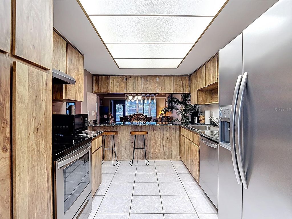 Photo of 7623 Radcliffe Circle #101A, Port Richey, FL 34668 (MLS # W7882392)