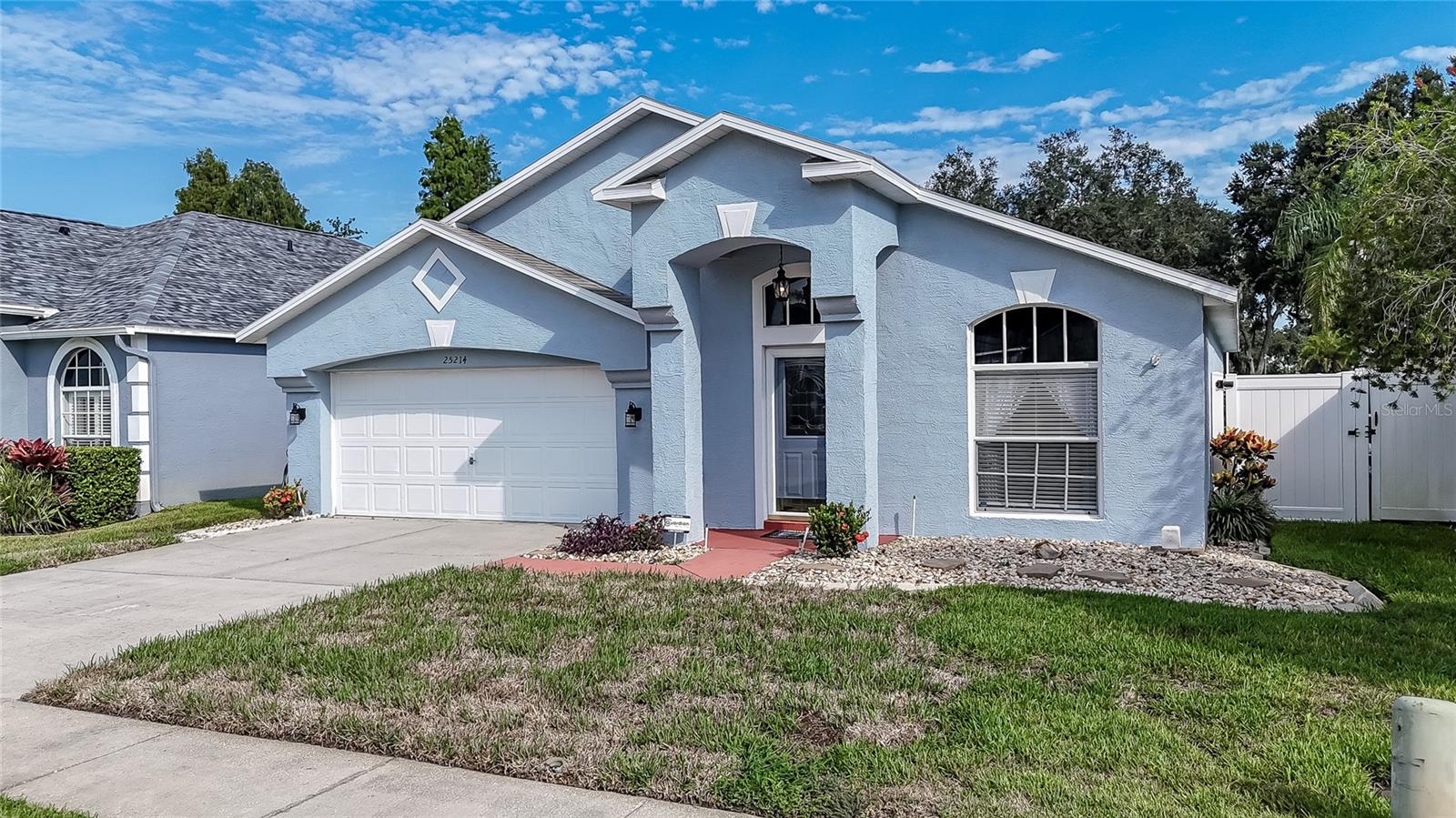 Move-in Ready Home in Desirable Stagecoach Village!
This well-maintained home welcomes you with a spacious formal living and dining room combo upon entry. The updated open kitchen features a breakfast bar and a separate eat-in area, seamlessly connecting to the great room, perfect for entertaining. The great room opens to a screened lanai, offering a comfortable indoor/outdoor living experience.
The split-bedroom floor plan features a spacious primary suite, complete with a walk-in closet, dual vanities, a walk-in shower, and a private en-suite bath. Two additional bedrooms share a full bathroom.
Additional features include vaulted ceilings, an indoor utility room with a washer and dryer, a 2-car garage with separate access, and a spacious, partially fenced backyard.
Community amenities include low HOA fees, no CDD, a community pool, spa, playground, fitness center, volleyball and basketball courts, dog runs, and scenic walking paths.
Conveniently located near Tampa Premium Outlets, Wiregrass Mall, Costco, dining, and major highways.
Schedule your private showing today!