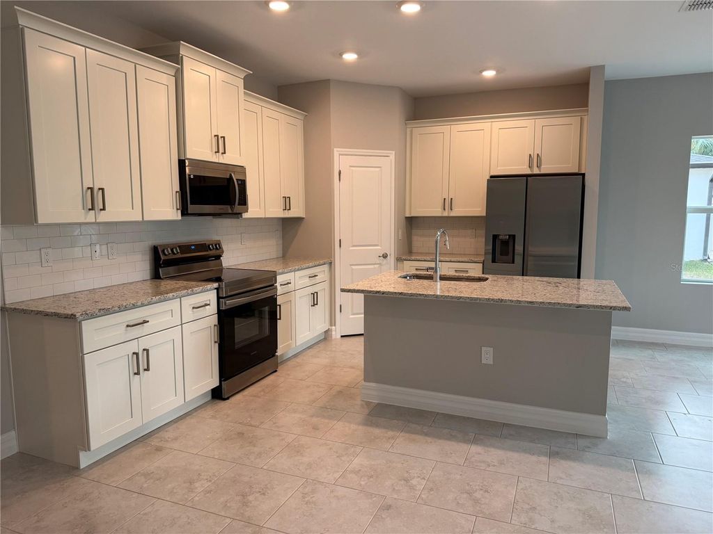 Photo of 1569 Kerman Street, North Port, FL 34288 (MLS # A4673998)