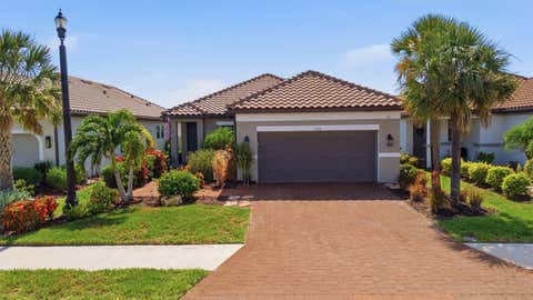 Photo of 11115 Devonbridge Drive, Palmetto, FL 34221 (MLS # TB8528245)