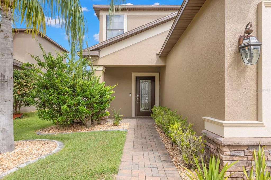 Photo of 11856 Crestridge Loop, New Port Richey, FL 34655 (MLS # TB8432476)