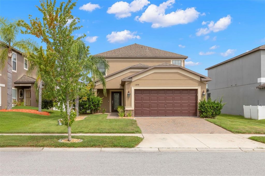 Photo of 11856 Crestridge Loop, New Port Richey, FL 34655 (MLS # TB8432476)