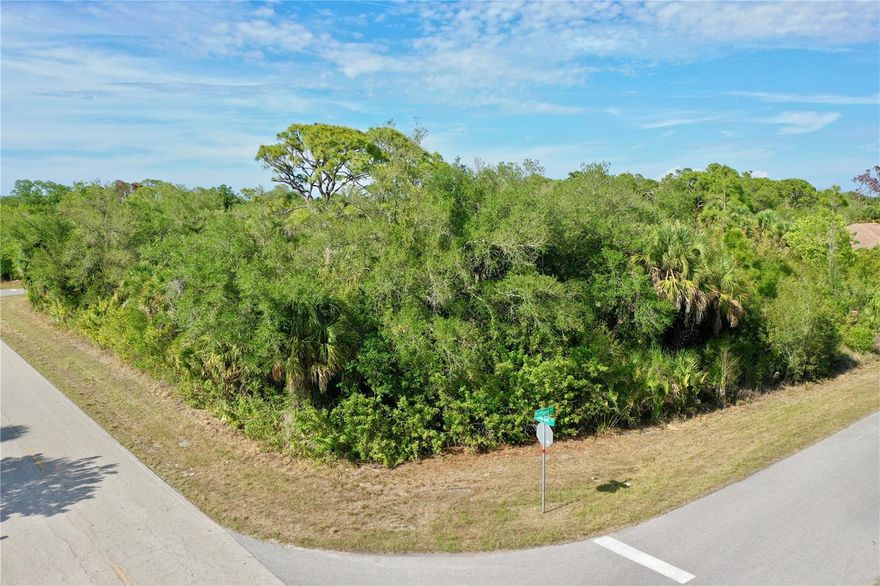Build your custom Florida home on this oversized .28-acre corner lot located at 12022 Kirtland Avenue. Boasting an expansive 12,087 square feet and an incredible 211 feet of road frontage, this property offers the rare space and flexibility needed for a side-load garage, a grand circular driveway, and a spacious backyard with plenty of room for a large, custom-designed pool. Convenience is already built-in with PUBLIC WATER available at the street, while a septic system will be used for construction. A major advantage for any builder or investor is that this lot is NOT in a scrub jay zone and contains NO wetlands, meaning a simpler, more cost-effective permitting process without the delays of environmental mitigation.

The location is perfectly positioned for both peace and accessibility, sitting just about 10 minutes from I-75. This allows for effortless travel north to the world-class dining and arts of Sarasota or south to Fort Myers and Naples. Wellness and nature are right around the corner, with the historic Warm Mineral Springs Park located just a short drive away, offering year-round 87-degree therapeutic waters. For those who enjoy an active outdoor lifestyle, nearby Myakkahatchee Creek Environmental Park and the North Port Estates Park provide miles of scenic hiking and biking trails through the authentic Florida landscape.

Sports fans and recreational enthusiasts will find themselves in the heart of the action. You are ideally situated between the Spring Training homes of the Tampa Bay Rays at Charlotte Sports Park and the Atlanta Braves at the stunning CoolToday Park in Wellen Park. For the avid golfer, championship courses like Riverwood Golf Club and Heron Creek are just minutes away, offering some of the best greens in Southwest Florida.

You can reach the pristine shores of Englewood Beach in approximately 25 minutes, or the historic charm and turquoise waters of Boca Grande in about 35 minutes. This region is a global destination for anglers, offering world-class flats fishing for snook and redfish, as well as the legendary tarpon fishing in the Boca Grande Pass. Whether you are looking to build your forever home or a seasonal escape, this corner lot provides the space, the utility connections, and the premier location to make it happen.