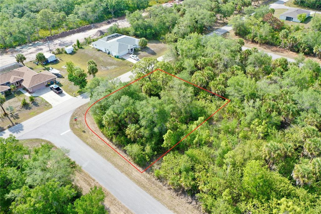Photo of 12022 Kirtland Avenue, Port Charlotte, FL 33953 (MLS # C7525924)
