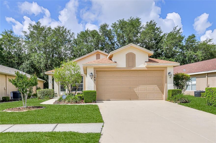 One or more photo(s) has been virtually staged. A perfect Jewel. 2/2/2 located in upscale 55+ Active Community that will not disappoint. From the moment you arrive the home exterior is inviting.  Storm door was added for convenience.  Laminate Flooring is extremely tasteful in the great room and bedrooms.  Tile in entry, kitchen and lg. nook, utility room and both baths.  Great room measures 18’x18’ with vaulted ceiling adds to the open floor plan. Kitchen features tile flooring, sweeping breakfast bar, plenty of cabinets that were upgraded and 42” in height with Corian counter tops, pantry & Eat-In Nook surrounded by windows that bring in the natural light. Split plan with a Primary bedroom that overlooks the private yard.  Primary bath with Walk-In-Shower and Closet. Guest bedroom with large Walk-In Closet and hallway with pocket door for privacy features an additional closet. Vaulted Ceilings throughout. Just painted (2 mos. Ago) interior, heat lamps in both baths, and windows have 3M tinting keeping the home cooler.

Inside Utility room for convenience and yes, the washer and dryer are included. From the Great Room, enjoy the enclosed Florida Room that can be used as an extension of the home, an office, tv room or craft room.  This is a very sought-after floor plan because of the space it offers. A/C 2024, Roof 2024, H/W Heater 2025.  The home has been maintained in a very special way by the original owner and it shows. This home has a maintenance package that offers, exterior painting, all mowing and shrub care, sprinkler system maintenance and roof maintenance.  Also HOA supplies fiber optic internet & full streaming service with many premium channels.
Wellington is a wonderful 55+ Community. 24-hour guard and gated with an 18,000 sq. ft. clubhouse, offering a ballroom, meeting rooms, a library, and an on-site restaurant. Enjoy the lifestyle with amenities such as an Olympic-sized heated pool, spa, pickleball, tennis courts, bocce, a fitness center, billiards and many clubs with activities to join in. Bar and Grill is so convenient, eat out by the pool or in the beautiful restaurant.


If you enjoy your daily walks, sidewalks and benches provided throughout the park like community. Pet friendly neighborhood.  Golf Carts are Welcome too!

Tampa is just 45 minutes away, with easy access to the Suncoast Parkway, making commutes to Tampa International Airport and all the city’s attractions a breeze. Hernando County offers a short drive to local beaches, fishing, kayaking and local restaurants. Priced to sell in a fabulous community.