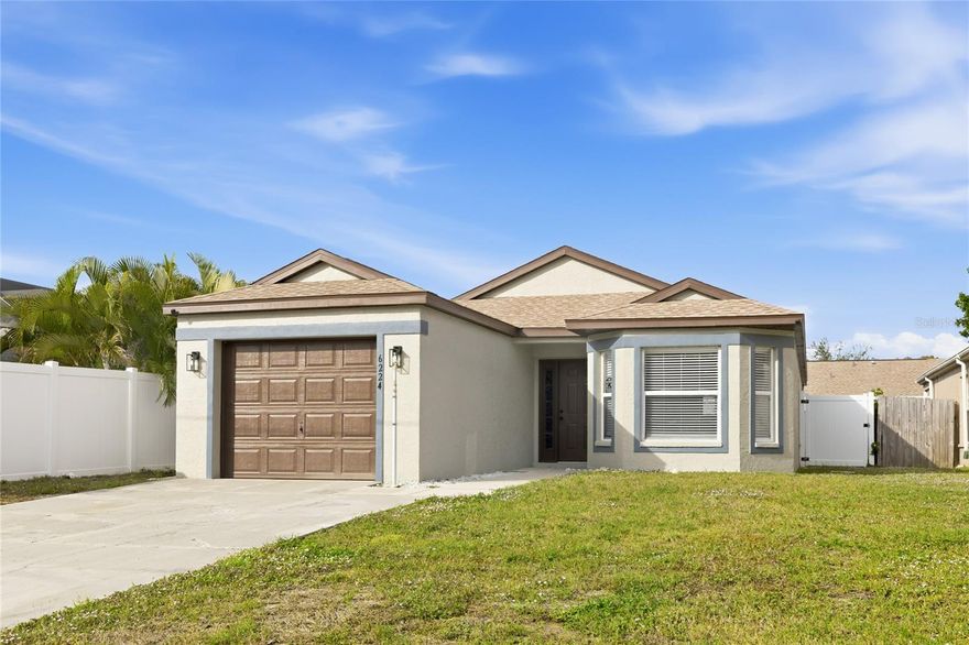 Step into a home  that is clean, crisp and completely move-in ready for you that includes a swimming pool!  This professionally refreshed interior offers 3 bedrooms, 2 bathrooms and a 1 car garage in a location that is just minutes from dining, hospitals, shopping and Bradenton's famous beautiful beaches.  From the moment you step into the foyer you'll feel the openness of this floor-plan that is enhanced by the vaulted ceiling creating a nice open atmosphere and sense of space.  The brand-new kitchen is absolutely lovely which overlooks the living area and pool beyond in one direction and a cozy breakfast nook and front yard in the other direction.  Quartz countertops, all new stainless steel appliances, bay windows in the breakfast nook, a barstool counter area, ceiling fan and great cabinet storage space all make this a perfect area for meal preparation and entertaining family and friends. The primary suite, which has a large walk in closet, is perfectly positioned so that you can enjoy views of the swimming pool and outdoors.  Tile flooring can be found throughout.  Step outside to your covered patio and screened in lap pool where you can enjoy a refreshing dip and the outdoors in a private setting surrounded by a 6' vinyl fence.  A covered patio area offers the perfect setup for relaxation and enjoying the fresh air. Extras include attic stairs, freshly sealed and painted exterior, gutters, ceiling fans and two storage sheds. Newer 2024 washer & dryer. The bigger ticket items are taken care of for you with a 2022 roof and a/c system. This home is located in a non-flood zone and non-deed restricted neighborhood with no HOA or CDD fees. This would make a great addition to an investor's portfolio.  Everything has been done on the inside ...  all that is left are your personal touches to make this lovely home yours.
