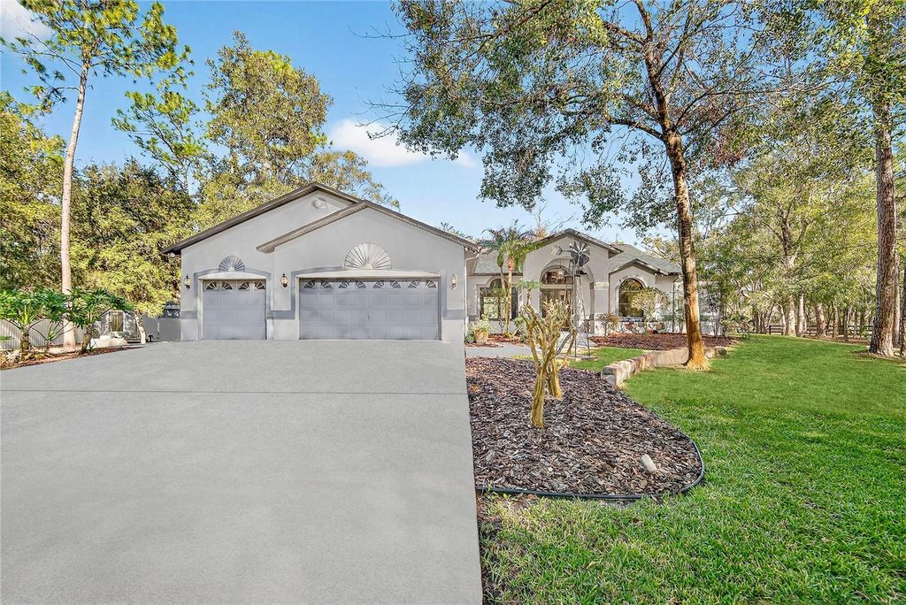 Photo of 8518 Quail Hollow Boulevard, Wesley Chapel, FL 33544 (MLS # TB8470102)