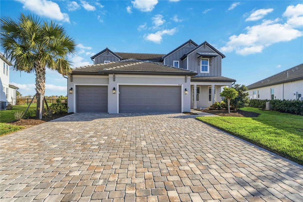 Photo of 17109 Sweetwater Village Drive, Lakewood Ranch, FL 34211 (MLS # A4686866)