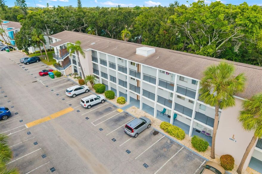 MOTIVATED SELLER! Priced for Quick Sale! Welcome to your Ground floor condo cozy Bradenton retreat in the friendly  55+ Third Bayshore community—where convenience, comfort, and an unbeatable location come together beautifully. 
Step inside and you’ll find a bright, inviting space featuring a recently updated electrical panel and a 2024 HVAC system ensuring year-round comfort. The layout flows easily between living, dining, and kitchen spaces, creating a light and open feel throughout. Just off the main living area, sliding glass doors lead to your enclosed private lanai, perfect for morning coffee, reading, or relaxing with the afternoon breeze.

Enjoy the convenience of dedicated parking spot #3 right outside your front door—just a few easy steps from your home. Inside you'll find a very rare dedicated laundry room.  A washer and dryer is included in this unit. So you can skip trips to the community laundry. A dedicated storage unit provides extra space for beach gear, seasonal items and more, making organization simple.

The Third Bayshore community offers the quintessential Florida lifestyle, featuring a community pool, shuffleboard, and a welcoming clubhouse where residents gather for social events and activities. The beautifully landscaped grounds and friendly neighbors make it easy to feel right at home.

Location is the icing on the cake—just eight miles from the pristine shores of Anna Maria Island, and about 20 minutes from downtown Sarasota’s vibrant arts and dining scene. Everyday conveniences are within minutes, with shopping, dining, and medical facilities all nearby. You’re also just a short drive from St. Armands Circle and Lido Beach, two of the Gulf Coast’s most beloved destinations. 

Whether you’re looking for a full-time residence or a seasonal escape, this move-in-ready condo delivers comfort, community, and value in one of the area’s most desirable 55+ settings. UNIT MUST BE OWNED FOR 2 YEARS PRIOR TO LEASING THE PROPERTY.