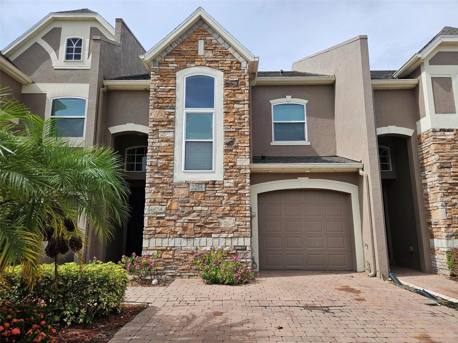 Beautuful townhome just minutes from everything!!! This property has tons of natural light and spacious floor plan which features an oversized kitchen, volume ceilings, a spacious family room, screened covered lanai and French doors, customized Master bedroom with a spa like master bath that is on the 1st floor. The second floor features a huge open loft that can be used as an office. You will enjoy your covered screened porch that opens onto your backyard. This amazing townhome is located just minutes from the airport, Lake Nona, University City, Universal Studios, SeaWorld and Walt Disney World as well as plenty of shopping, dining and public transportation.