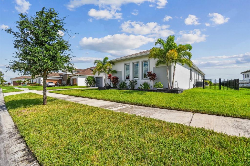 Photo of 8936 Sanders Tree Loop, Wesley Chapel, FL 33545 (MLS # O6299274)
