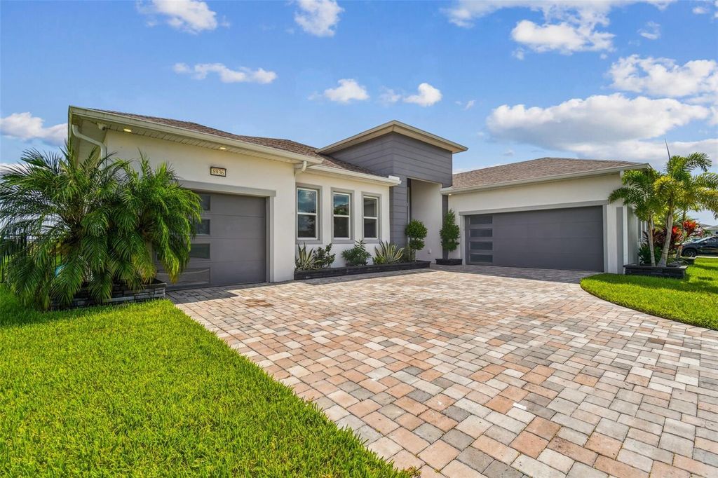 Photo of 8936 Sanders Tree Loop, Wesley Chapel, FL 33545 (MLS # O6299274)